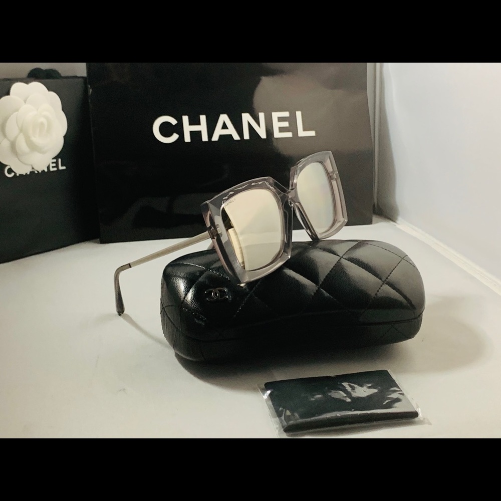 Chanel 18K Gray with White Gold mirror lenses.